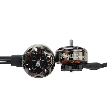 Top and side view of Bling 1103 motor showing rotor bell vents, shaft, and copper windings
