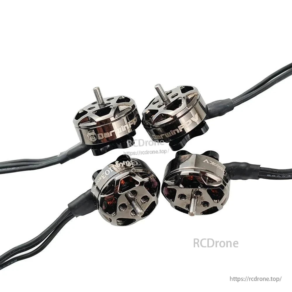 Four Bling 1103 motors arranged in an X layout, showing shafts, wiring, and bell cutouts