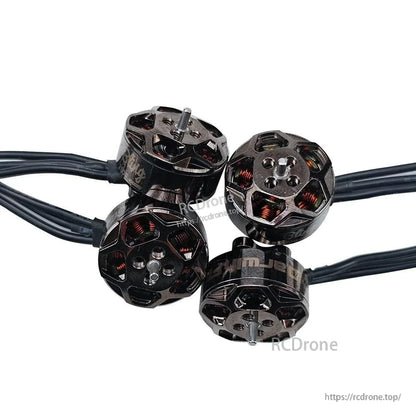 Set of four Bling 1504 brushless motors laid out together, top views with mounting holes