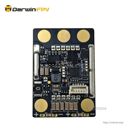 ESC board close-up with large battery pads, MOSFET area, and white signal connector at bottom right