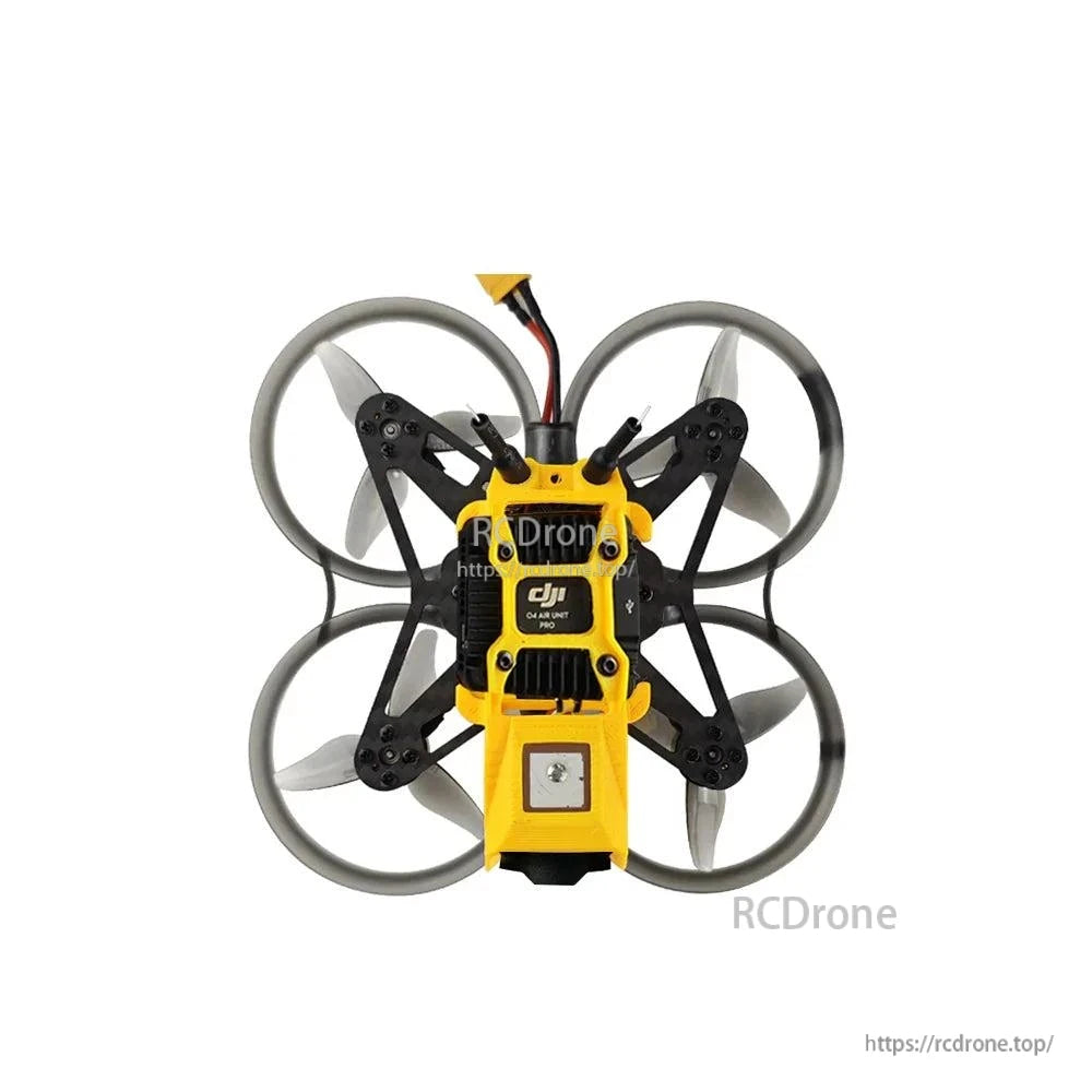 Underside view with square patch module and black electronics plate centered between prop ducts