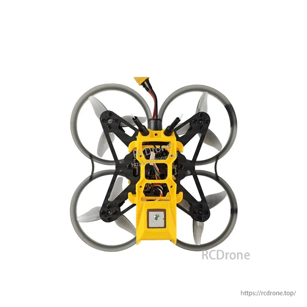 Bottom view with canopy window showing internal wiring and stacked components inside the frame