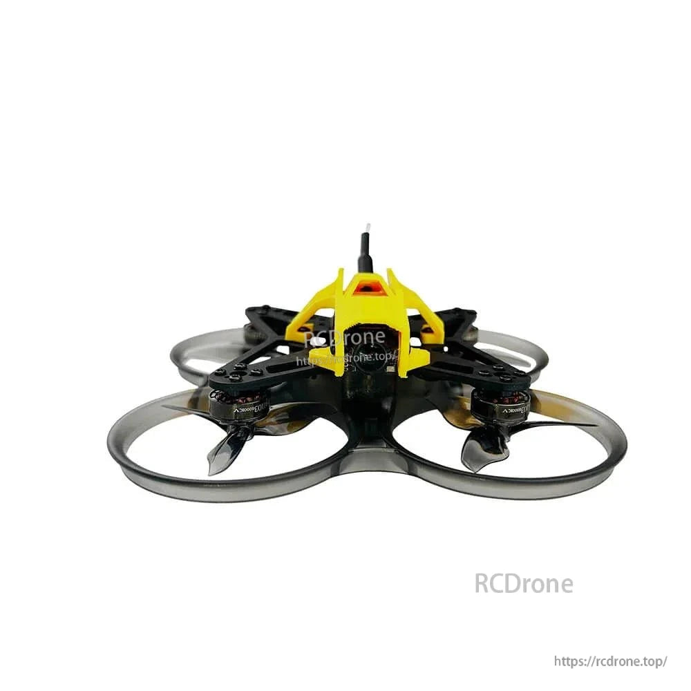 Rear-level view of ducted whoop drone showing motor arms, prop ducts, and canopy rear opening