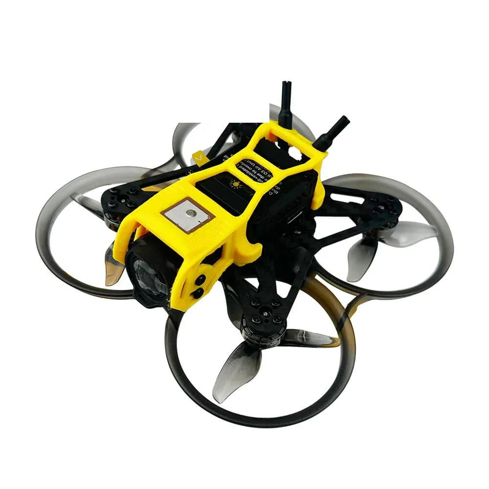DarwinFPV whoop FPV drone, underside angled view showing camera housing and square patch module