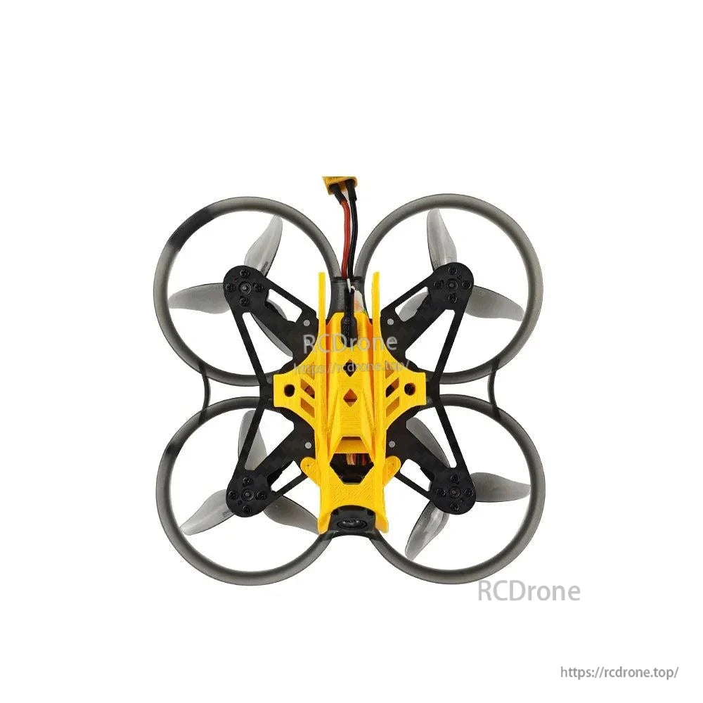 Close top view highlighting front camera opening and yellow canopy contours over the frame