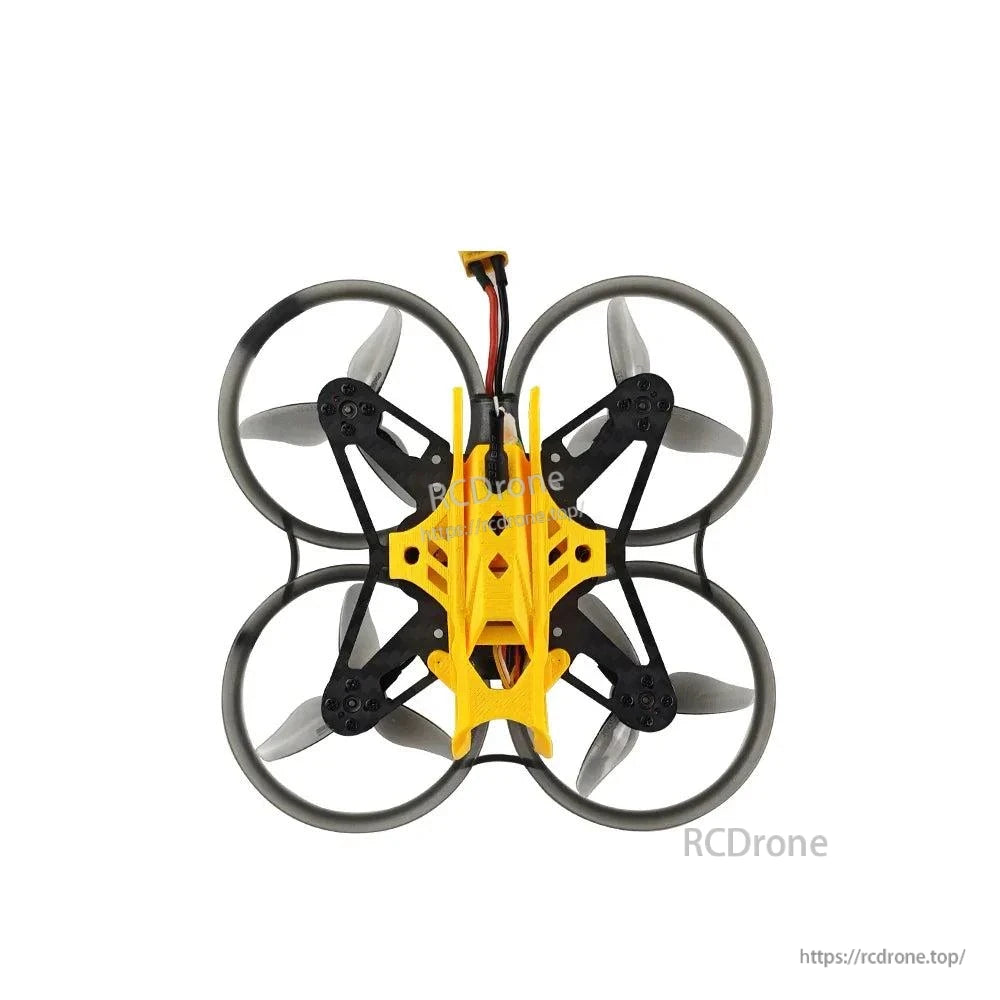 Wide top view of the ducted whoop drone showing full frame outline and prop duct spacing