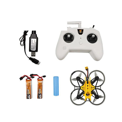 Kit contents layout: white controller, yellow cinewhoop quad, USB charger, two LiPo batteries and blue battery pack