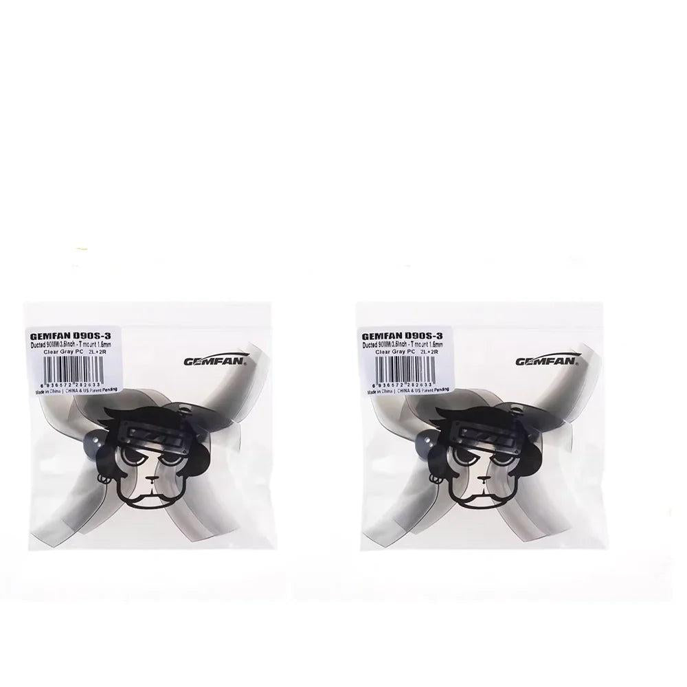 Two Gemfan D90S-3 clear gray 3-blade 90mm propeller packs shown side by side on white background