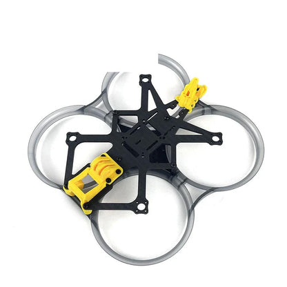 DarwinFPV CineApe35 FPV Frame assembled with grey duct guards and yellow camera mounts, top view