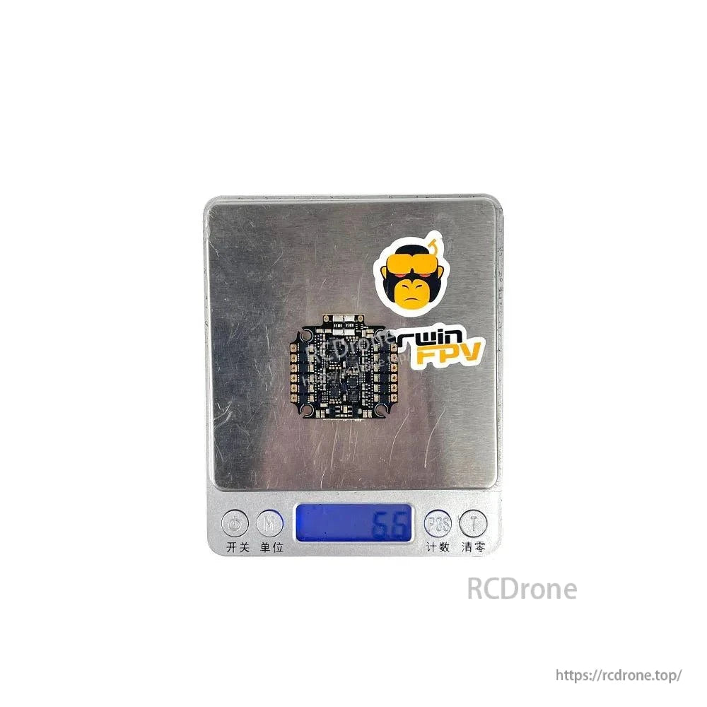 ESC board shown on digital scale displaying 5.8 g