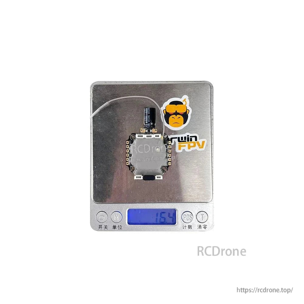 AIO FC/ESC stack shown on digital scale displaying 15.4 g