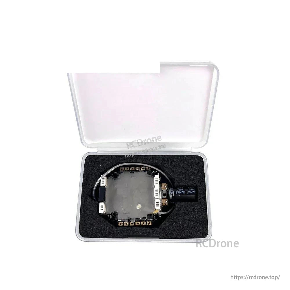 Product packed in clear plastic storage box with foam insert, board and capacitor secured inside