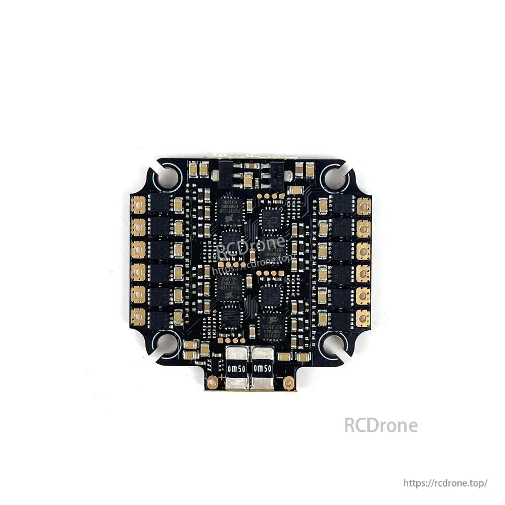 4-in-1 ESC board component layout with MOSFETs and motor pad arrays around the edges