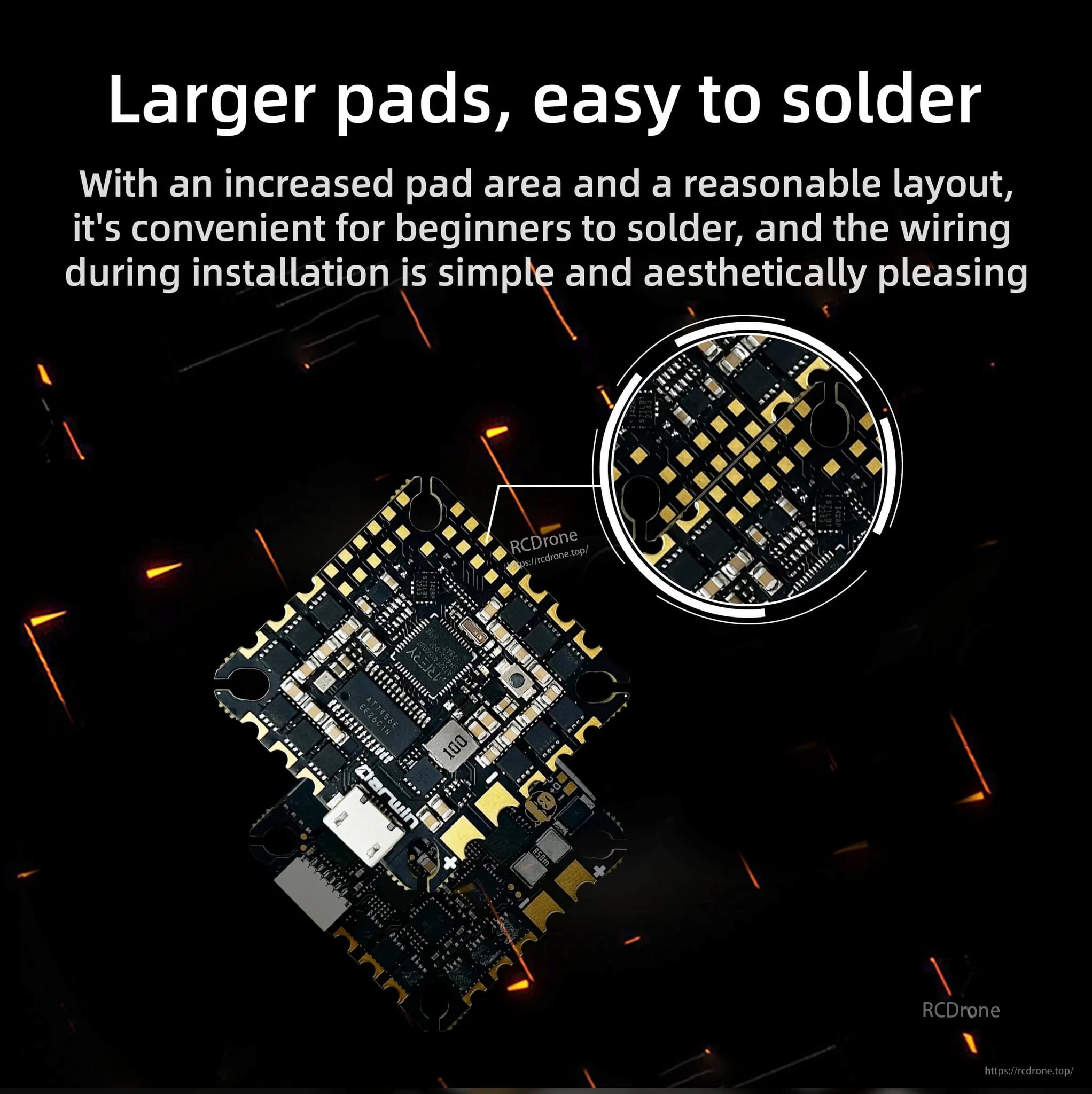 Close-up of enlarged solder pads and component layout on DarwinFPV F435 AIO for easier wiring and soldering