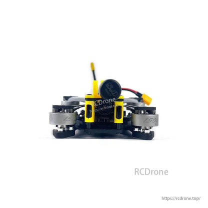 Front view close-up of FPV camera housing and motor ends on compact folded drone