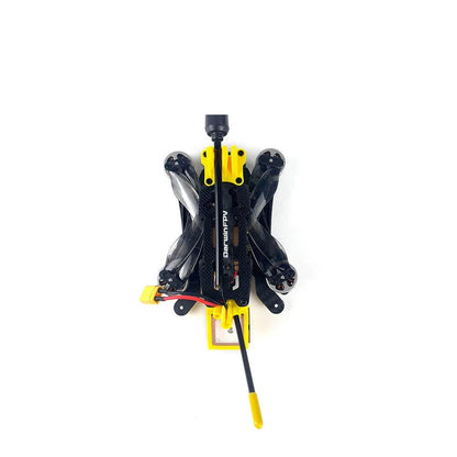 DarwinFPV FoldApe4 FPV drone folded for transport, compact top view with props tucked in