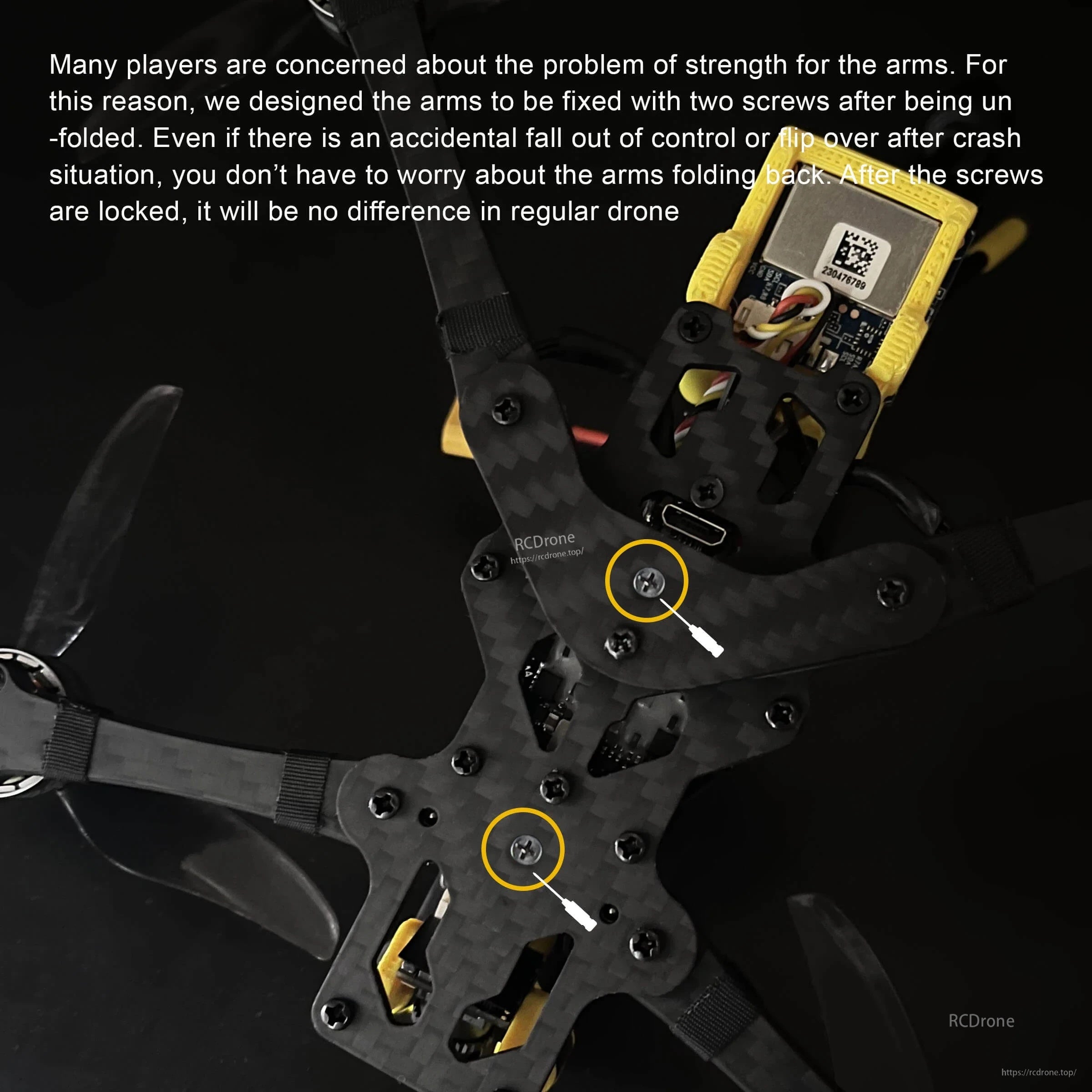 Close-up of FoldApe4 frame showing two arm-lock screws that secure the folding arms after unfolding