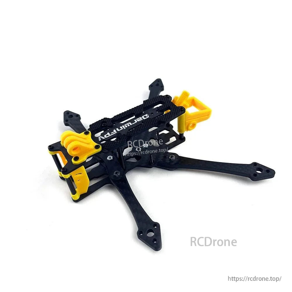 DarwinFPV FoldApe4 analog frame assembled, angled view showing fold mechanism and TPU mounts