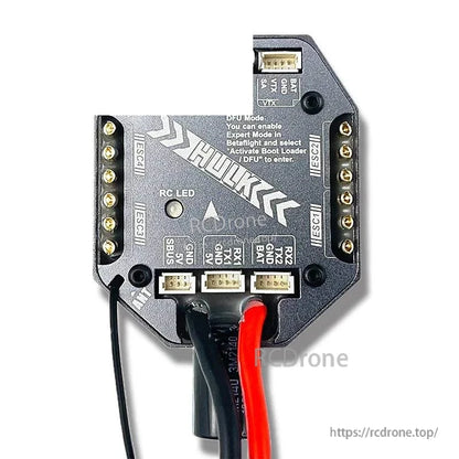Connector and pad layout close-up on HULK AIO board with labeled ports and solder pads