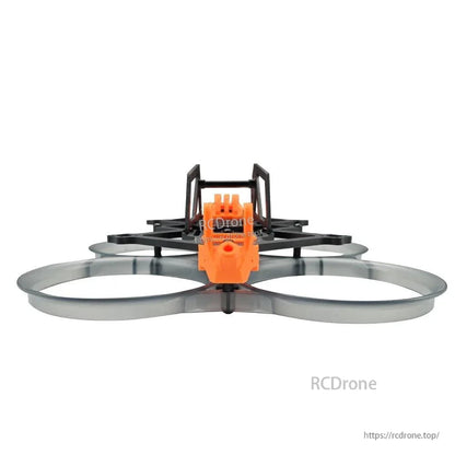 Rear view of ducted FPV frame with orange TPU tail mount and carbon brace posts