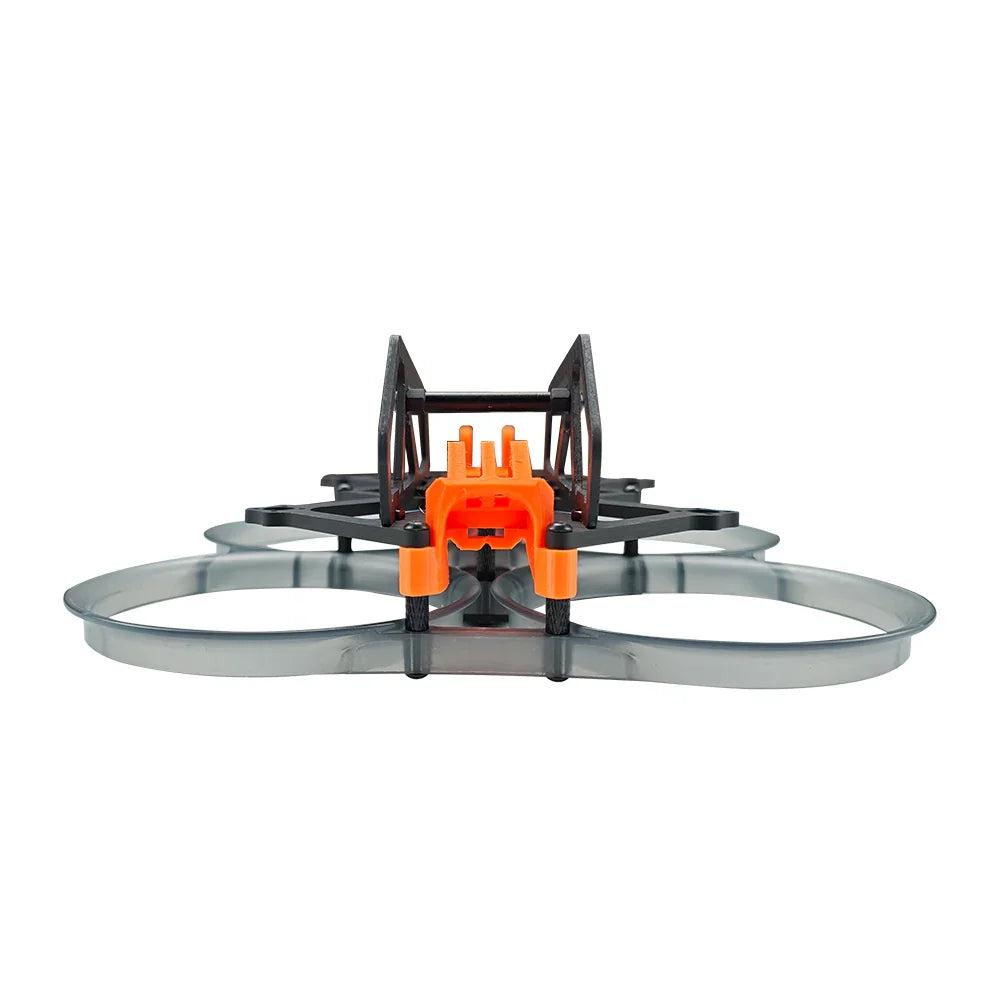Front view of mini ducted FPV frame with orange camera mount and carbon side plates