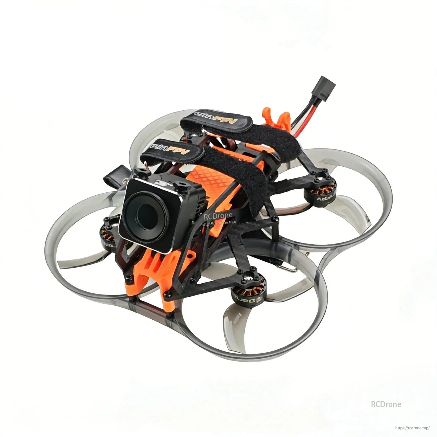 Angled front view with cube action camera mounted on orange bracket and ducted prop guards