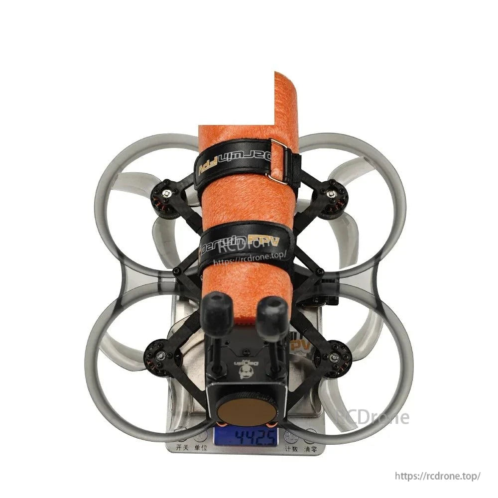 Front view on digital scale showing weight reading 442, with ducts and foam float visible