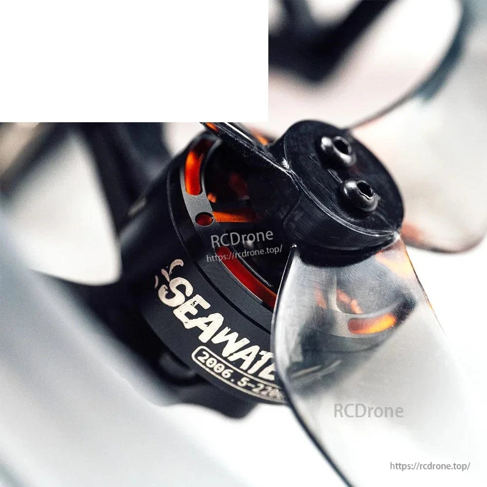 Close-up of brushless motor bell and prop hub showing motor label and wiring