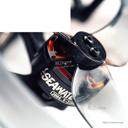 Close-up of brushless motor bell and prop hub showing motor label and wiring