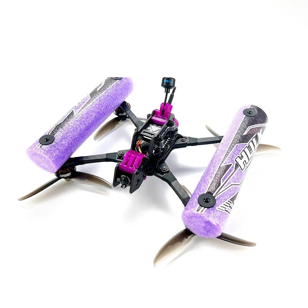 DarwinFPV HULK FPV drone with purple foam side bumpers, angled view showing frame and propellers