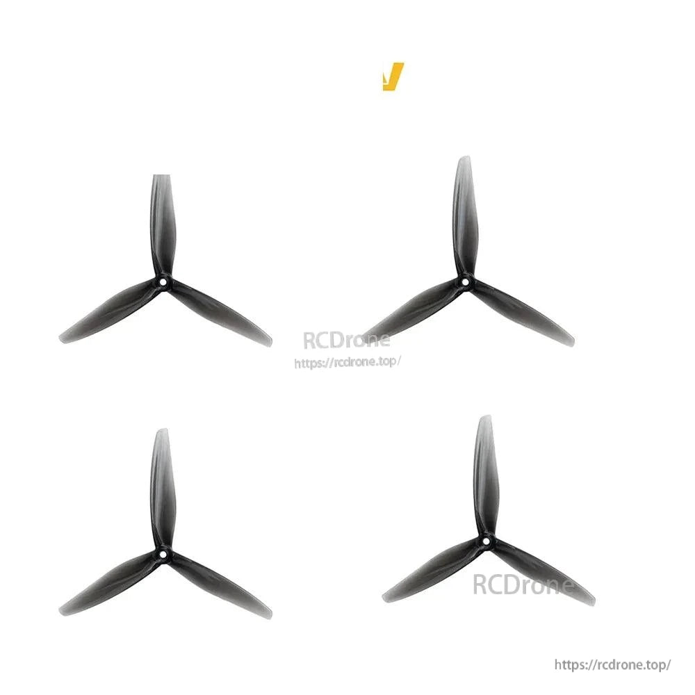 Set of four clear gray 7-inch tri-blade propellers shown from above, matching 5mm mount