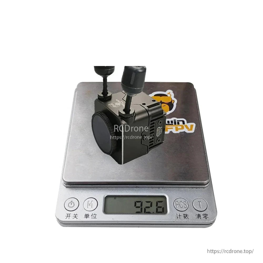 Assembled unit on digital scale showing 92.6 g weight