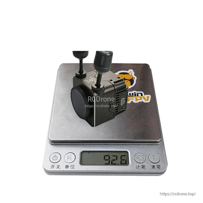 Assembled unit on digital scale showing 92.6 g weight
