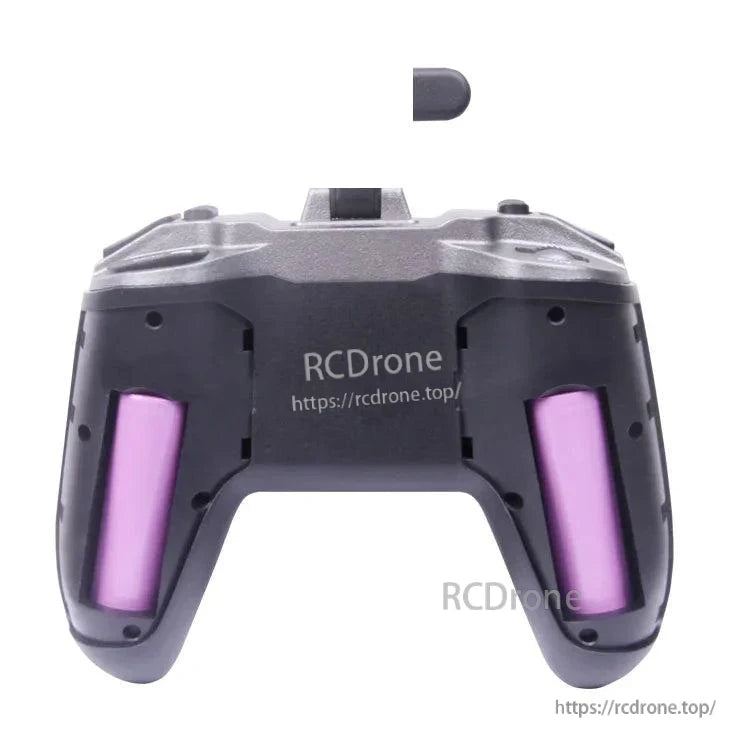 TX-Lite transmitter rear view with dual battery compartments visible inside the grips