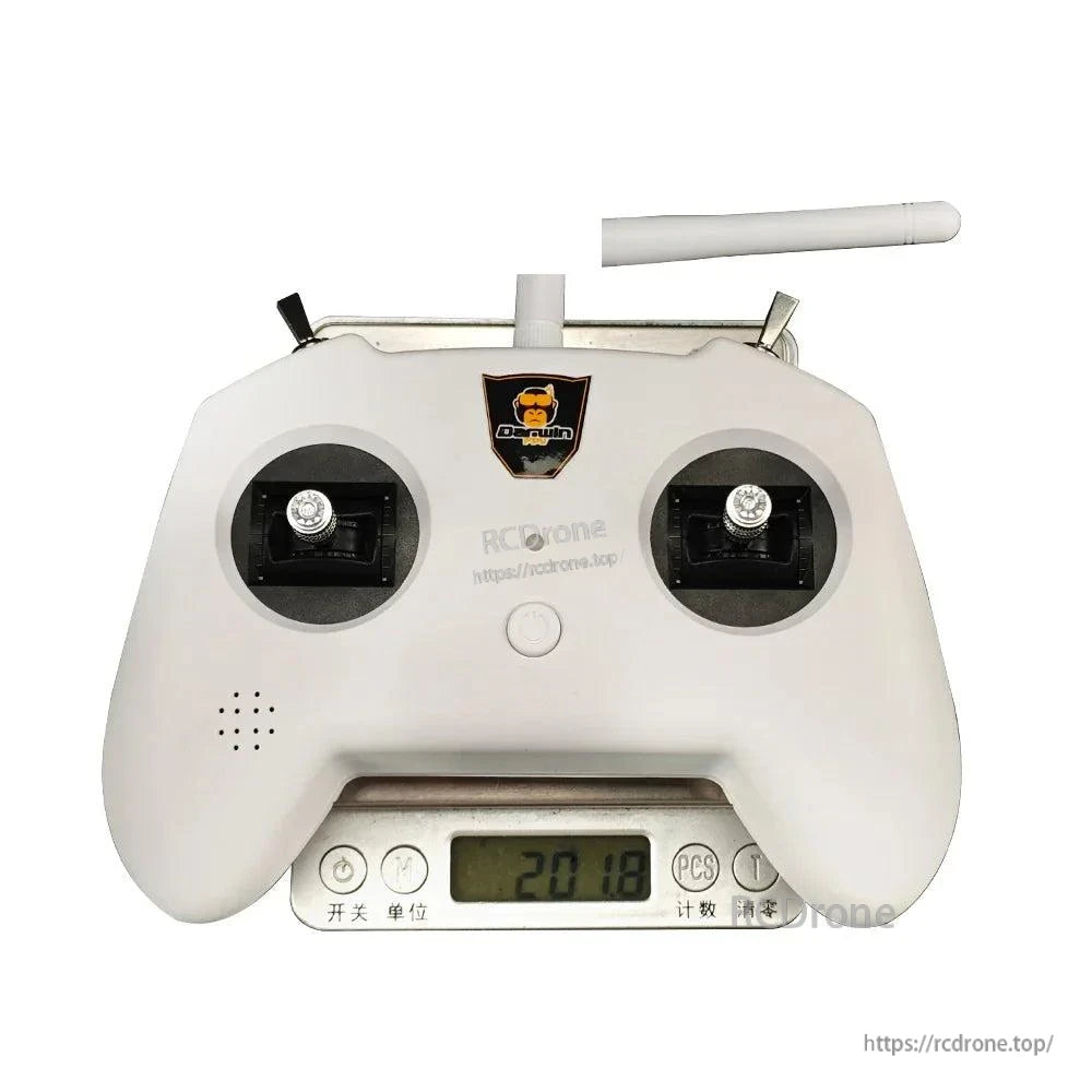 DarwinFPV TX8 ELRS transmitter on digital scale showing 201.8 g weight