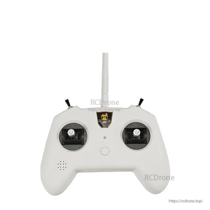 White TX8 transmitter straight-on view showing gimbal sticks, power button, and logo badge