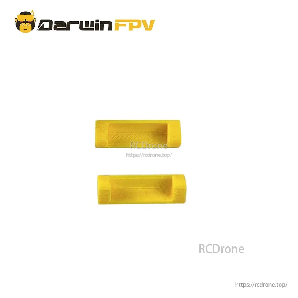 Two yellow TPU battery pads/spacers included with frame kit, rectangular pieces shown