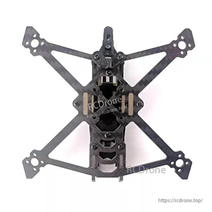Top view of assembled frame showing center stack area, standoffs, and arm layout