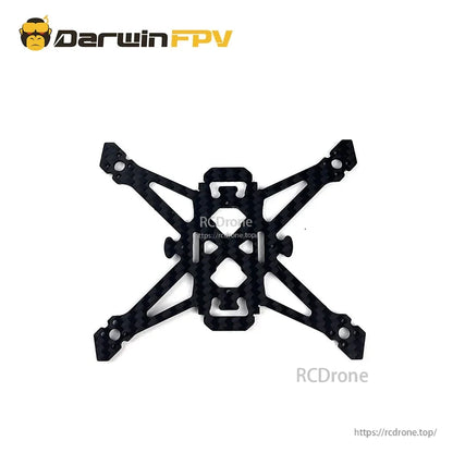 Carbon fiber X frame plate with central mounting cutouts and four motor arm ends, top view
