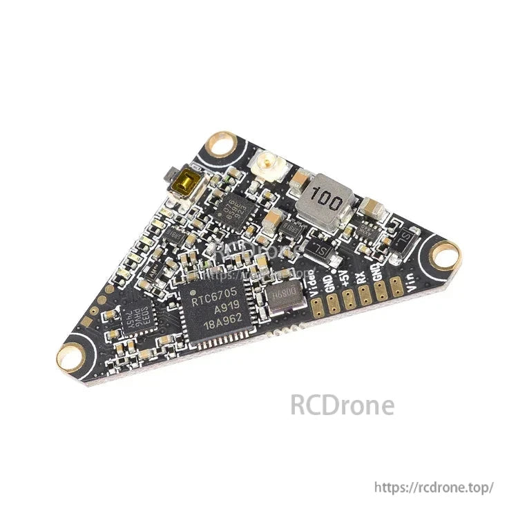 Angled view of VT5804 5.8GHz FPV video transmitter board showing component layout and pad markings