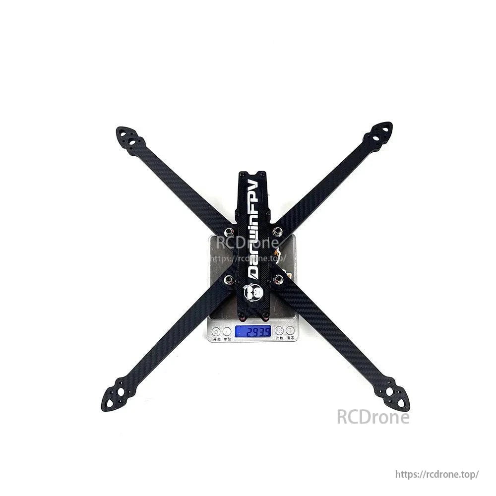 DarwinFPV X10 foldable 10 inch FPV drone frame on a digital scale showing frame weight