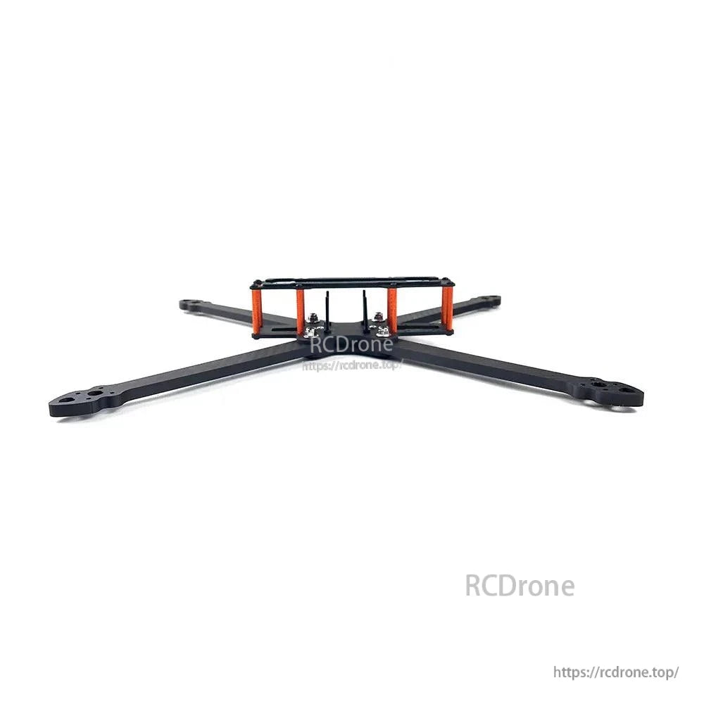Rear low-angle view of the FPV frame showing top plate, standoffs, and arm mounting points