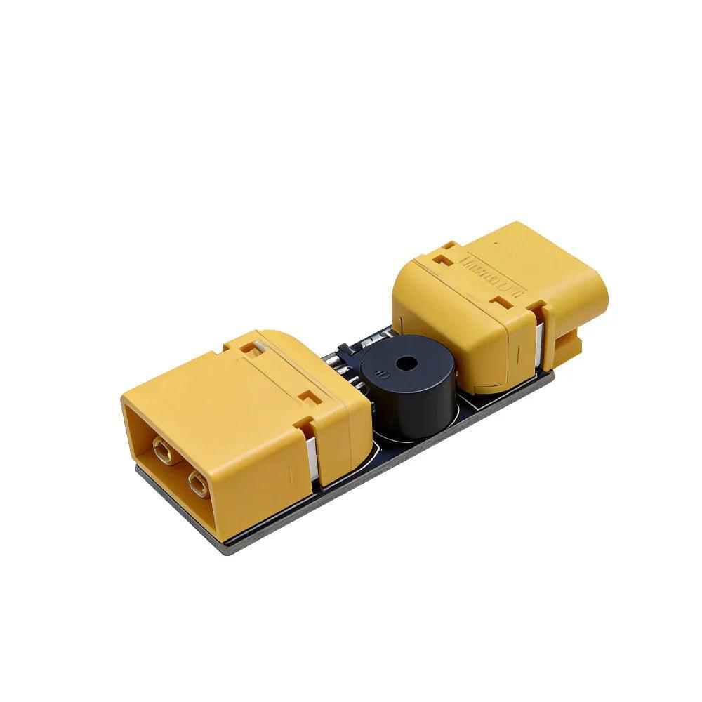 Angled perspective of smoke stopper module with XT30 and XT60 connectors and onboard buzzer