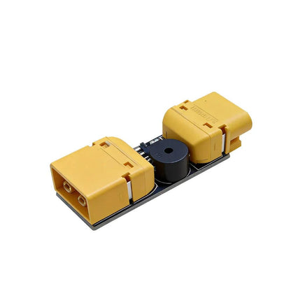 Angled perspective of smoke stopper module with XT30 and XT60 connectors and onboard buzzer