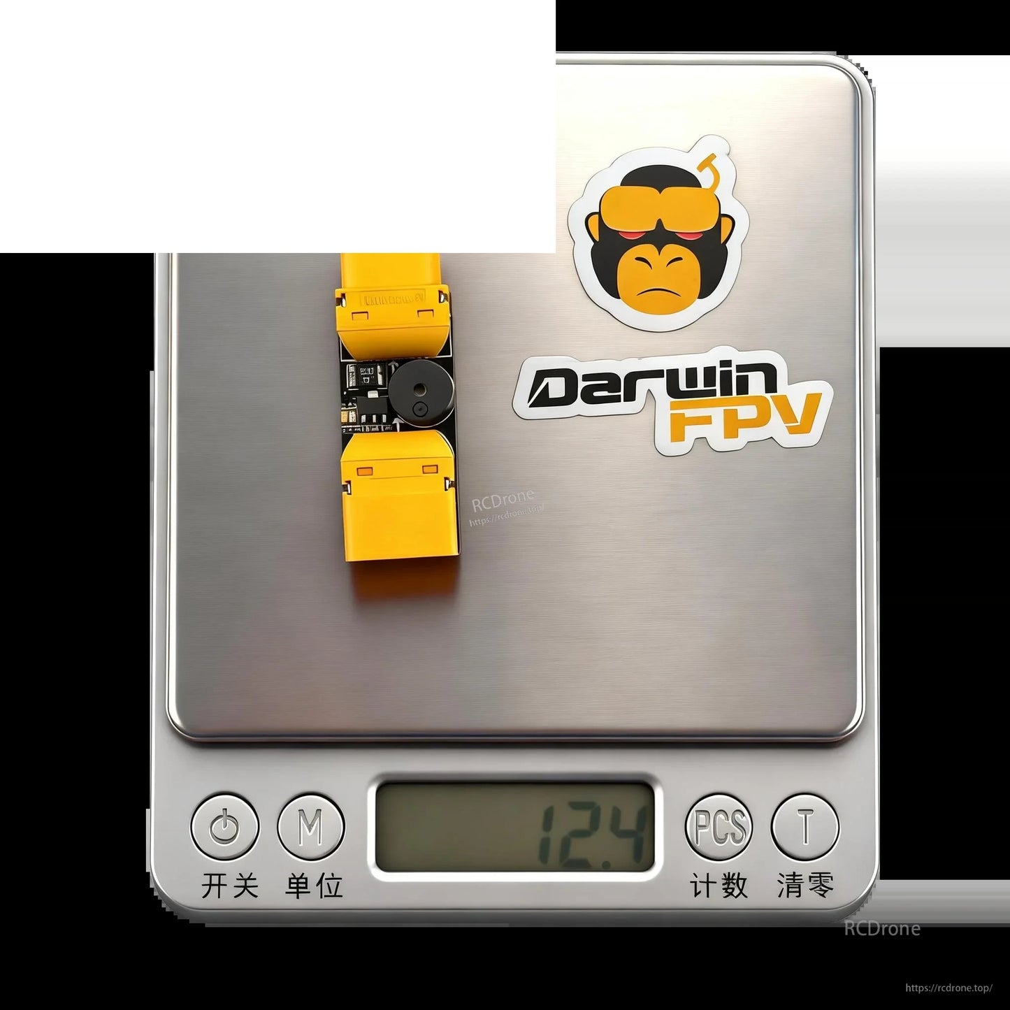Device on digital scale showing 12.4 g weight next to DarwinFPV logo sticker