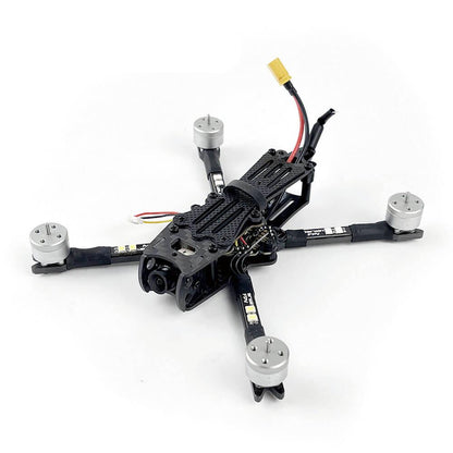 DarwinFPV FPV racing drone frame featuring four motors and a carbon fiber structure, ideal for high-speed quadcopter builds