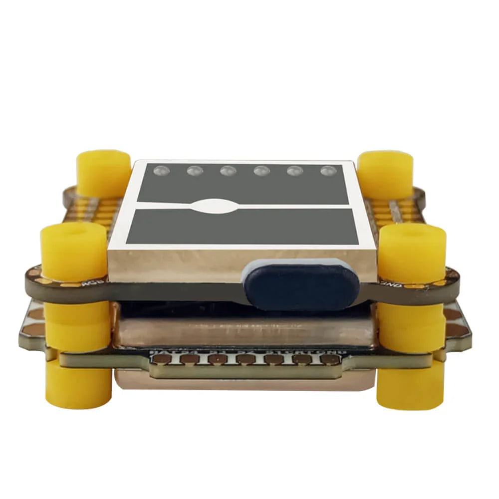 Side view of DarwinFPV Cement stack showing metal shield and waterproof rubber port cover
