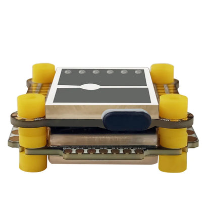 Side view of DarwinFPV Cement stack showing metal shield and waterproof rubber port cover
