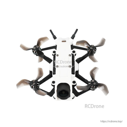 Top-down view of the quadcopter drone showing X-frame layout and four 2-inch props without prop guards