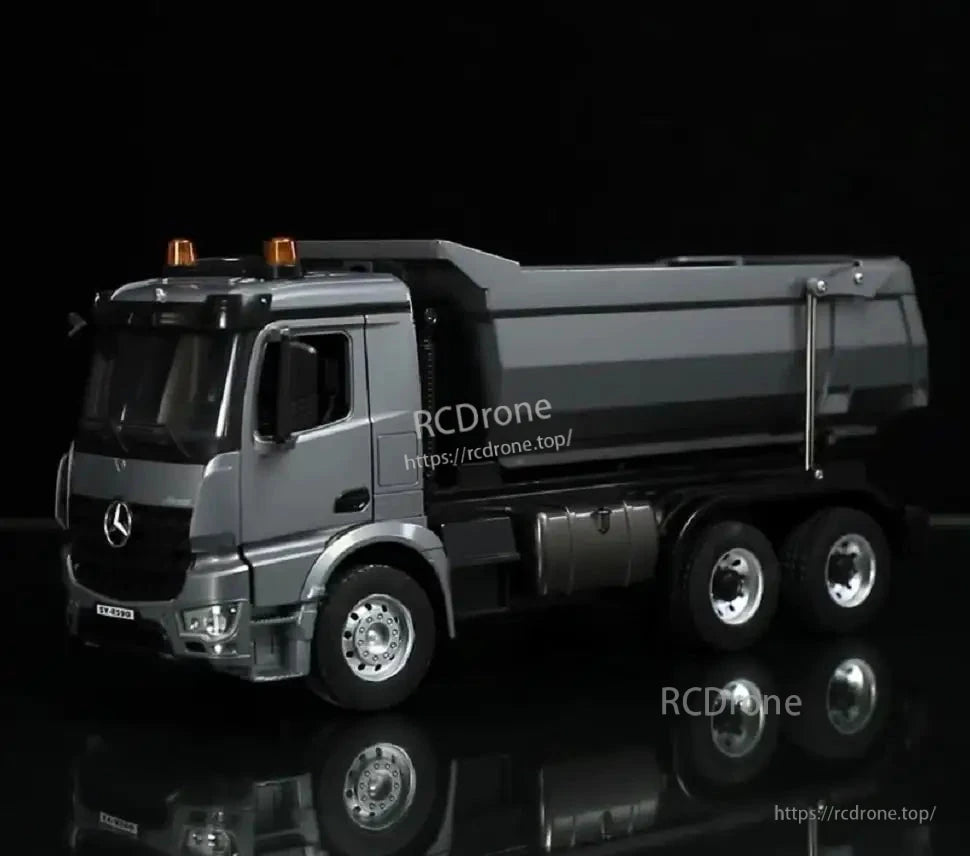 Mercedes-Benz truck with detailed design and reflective surface.